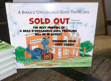 Load image into Gallery viewer, Buy One Donate One - A Bras d&#39;Orosaurus Goes Traveling (Hardcover)